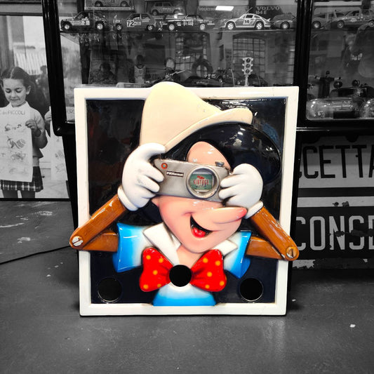 Insegna - Pinocchio fotografo